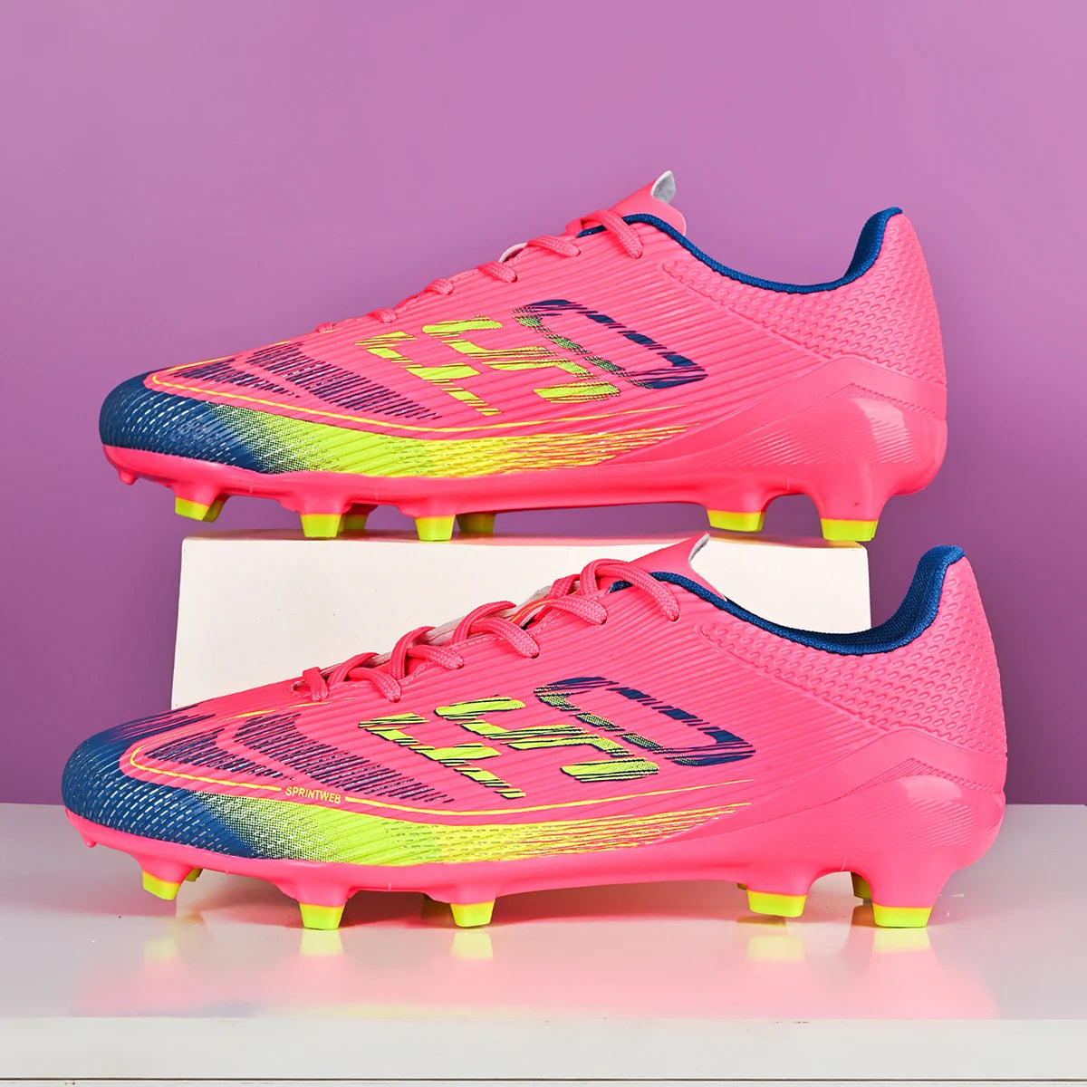 Chaussures de football pour hommes, modèle AG FG hybride, semelle extérieure en caoutchouc résistant à l’usure, tige en PU respirant, idéales pour les matchs sur gazon naturel.