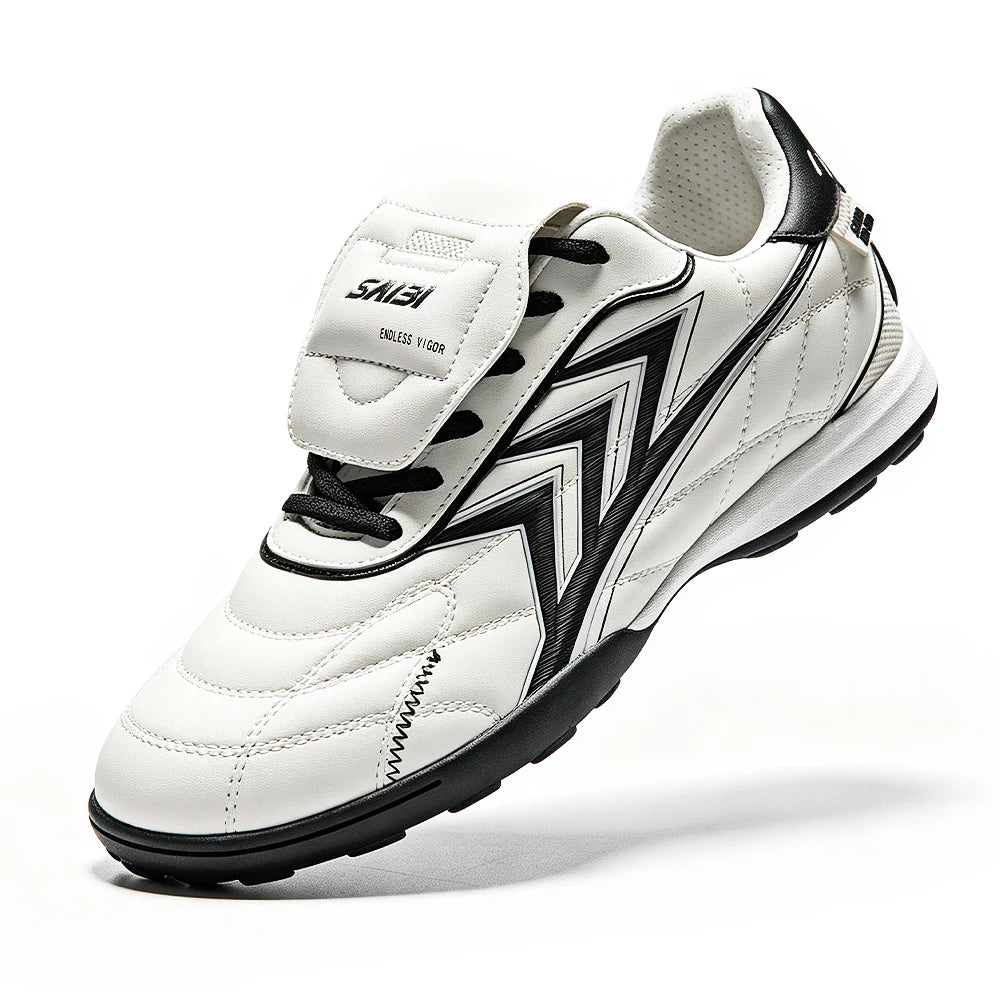 Chaussures de football pour hommes FG pour terrain ferme, tige en PU souple, crampons en caoutchouc renforcés, pour adultes, pour les matchs de football en plein air et l'entraînement sur pelouse.