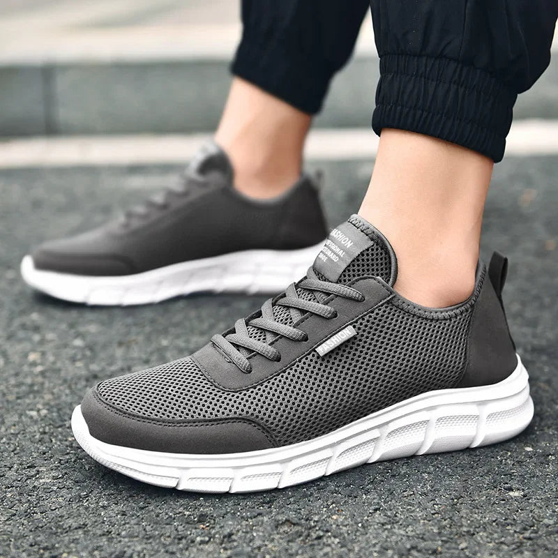 Nouvelle maille hommes chaussures Lac-up chaussures décontractées hommes baskets respirant chaussures légères confortables Sport formateurs Zapatillas Hombre