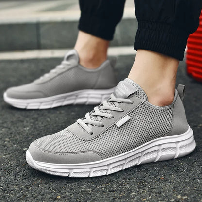 Nouvelle maille hommes chaussures Lac-up chaussures décontractées hommes baskets respirant chaussures légères confortables Sport formateurs Zapatillas Hombre
