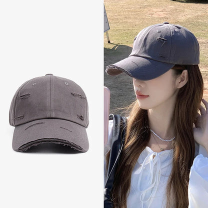 Men's and women's new spring and summer hip-hop versatile soft top curved eave retro personality distressed hole duckbill hat