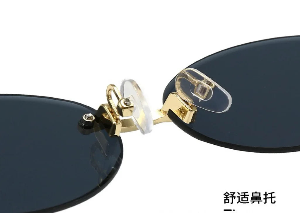 Rammeløse solbriller, ovale, moderigtige, populære solbriller til kvinder og mænd, små, elliptiske solbriller til kvinder og mænd, til fest og rejser